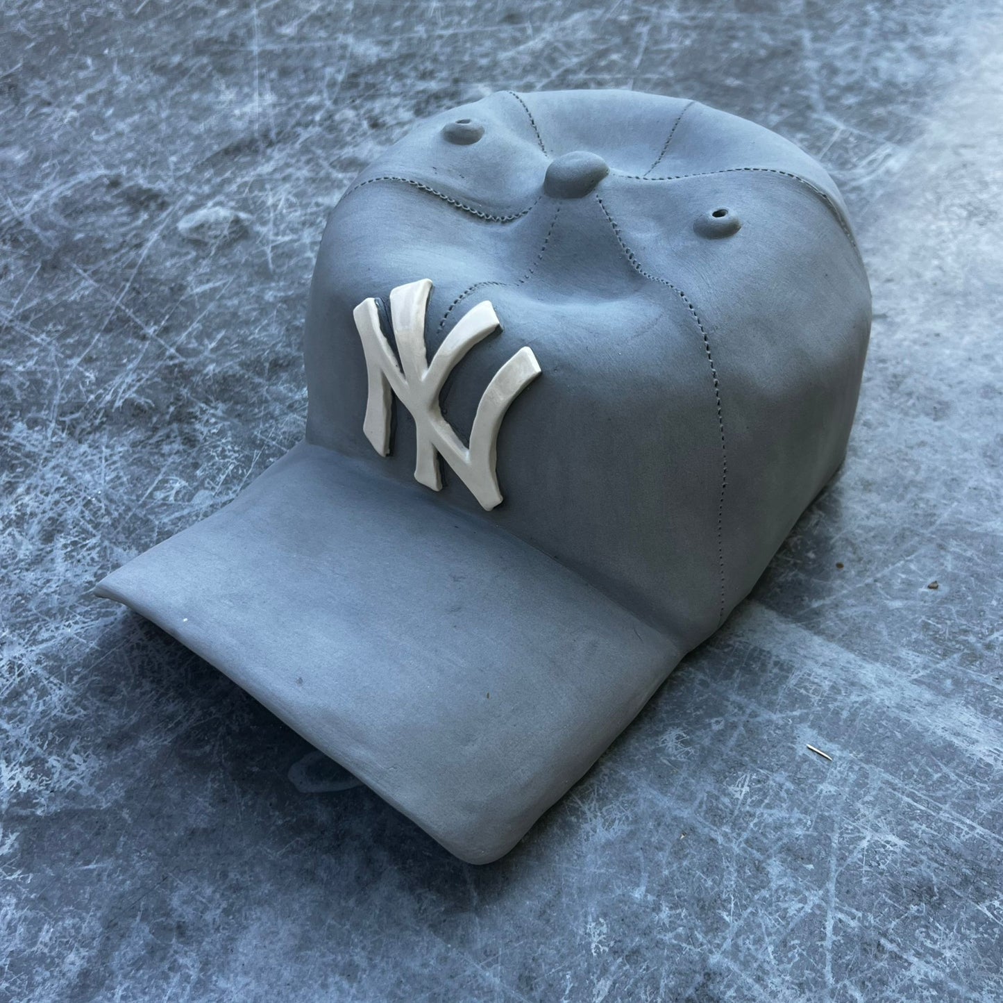 NY Yankees Ceramic Cap Sculpture (Grey) - Figurative Sculpture